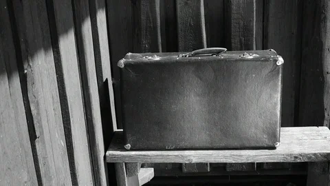 Suitcase on the bench, black and white Stock Footage 110844563