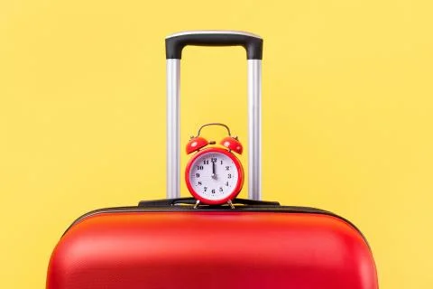 A suitcase with a clock Stock Photos