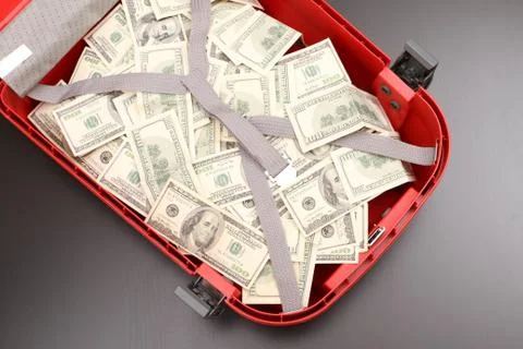 Suitcase with dollars Foto stock
