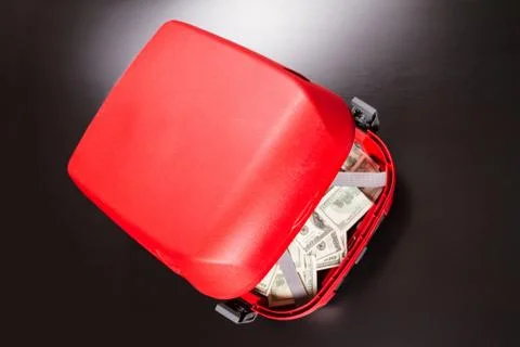 Suitcase with dollars. Stock Photos