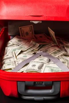 Suitcase with dollars. Stock Photos