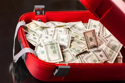 Suitcase with dollars. Stock Photos