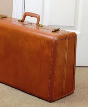 Suitcase by the door Stock Photos