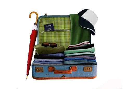 Suitcase with full of clothes Stock Photos