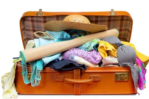 Suitcase full of clothes. Stock Photos