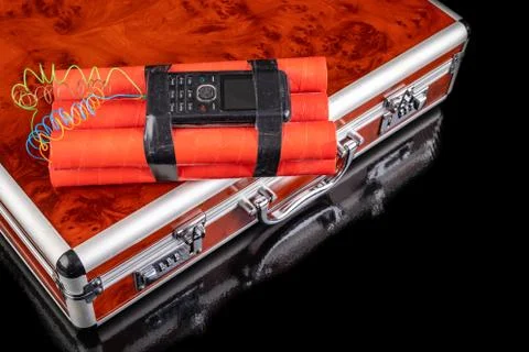 The suitcase is locked with a combination with an explosive charge. A trunk f Stock Photos