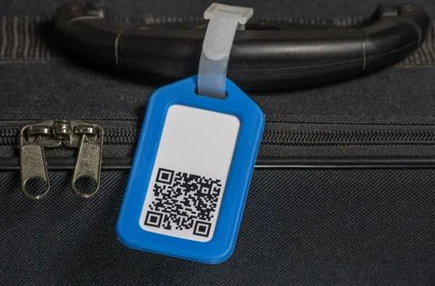 Suitcase with qr code on label suitcase with qr code on label Copyright: x... Stockfoto's