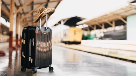 Suitcase for traveling on the platform Stock Footage 202081284