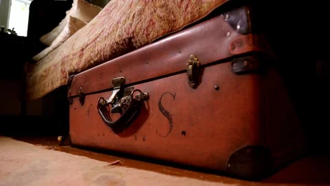 Suitcase under the bed Video stock 77827659