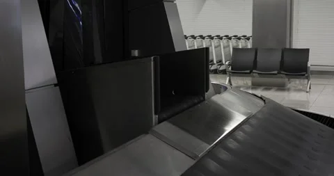 Suitcases on the baggage carousel at the airport Stock Footage 304431117