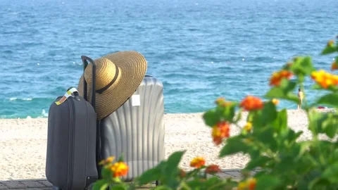 Suitcases on sandy tropical beach. Vacation concept Stockbeeldmateriaal 80404497