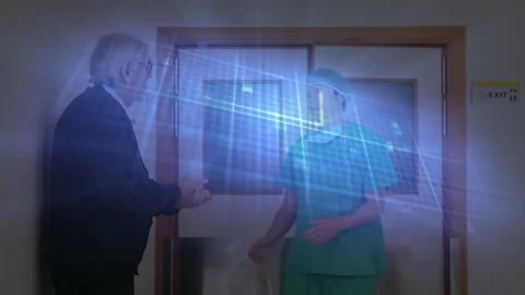Suited hospital admin pulling glass doors open and welcoming surgeon with Stock Footage 311417037
