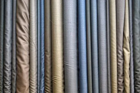 Suits material rolls Stock Photos