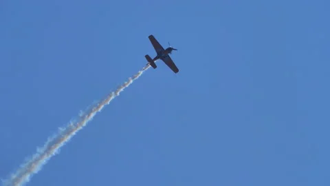 Sukhoi Su-31 propeller acrobatic aircraft amazing maneuvers at airshow display Stock Footage 201662441