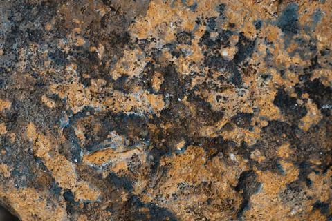 Sulfuric rock close up. Background image Stock Photos