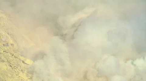 Sulphur blocks mined by local workers on mountain volcano Java Stock Footage 67394185