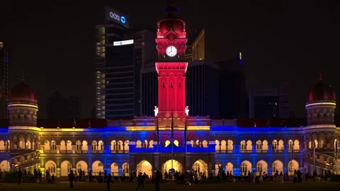 Sultan Abdul Samad Building illuminated in Malaysian Jalur Gemilang flag colors Vídeo Stock 345092009
