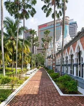 Sultan Abdul Samad Jamek Mosque in Kuala Lumpur, Malaysia presents a pathway Stock Photos
