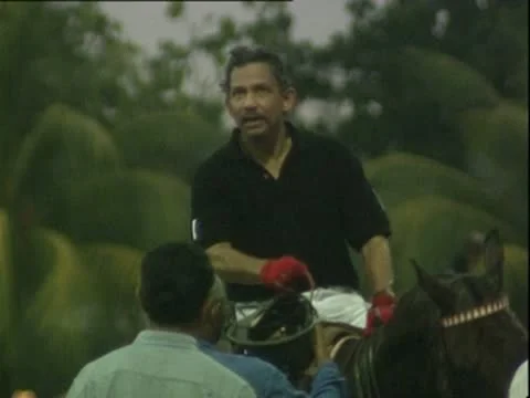 Sultan of Brunei playing polo Stock Footage 10574327