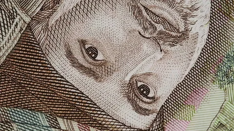 Sultan Qaboos bin Said al Said on the Oman half rial banknote slow rotating Stock Footage 101423915