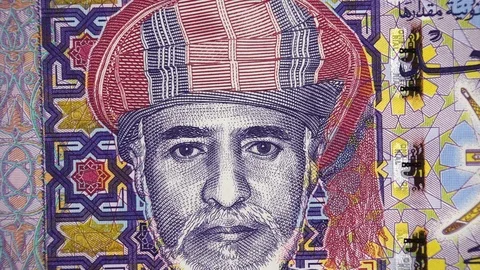 Sultan Qaboos on the Oman 1 rial 2015 banknote rotating, Omani money close up Stock Footage 99162308