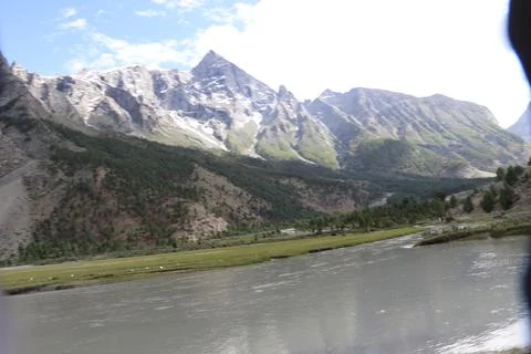 Sultanabad Basho Valley – Streams, Forest, and Snow-Capped Mountains Stock Photos