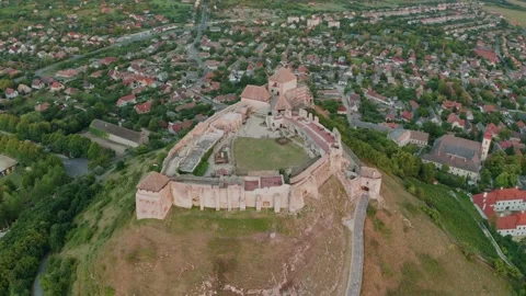Sumeg, Hungary - 4K drone flying around at the Castle of Sumeg at sunset Stock Footage 138005704