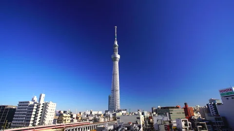 Sumida Ward, Japan - 12/17/2018: View of Tokyo Skytree and Tobu Railway Trains Video stock 330951925