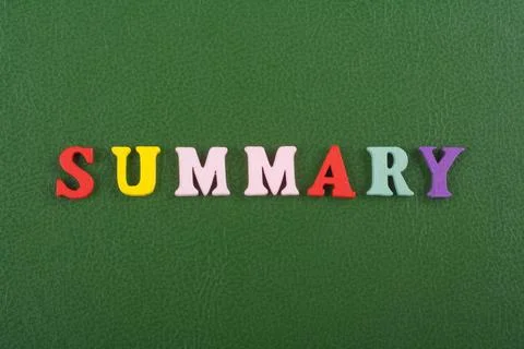 SUMMARY word on green background composed from colorful abc alphabet block .. Stock Photos