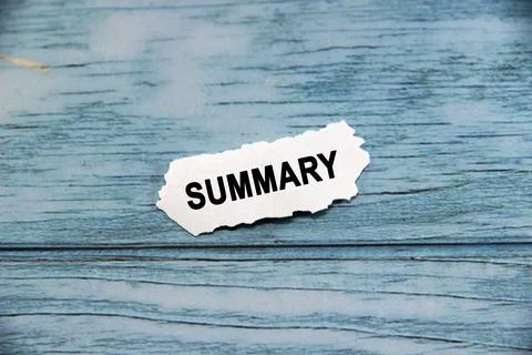 Summary wording  or text on small piece of hard white plastic with blue bac.. Stock Photos