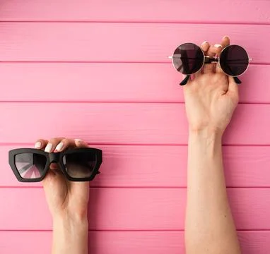Summer abstract background mockup template woman hands hold Couple sunglass.. Stock Photos