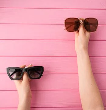 Summer abstract background mockup template woman hands hold Couple sunglass.. Stock Photos