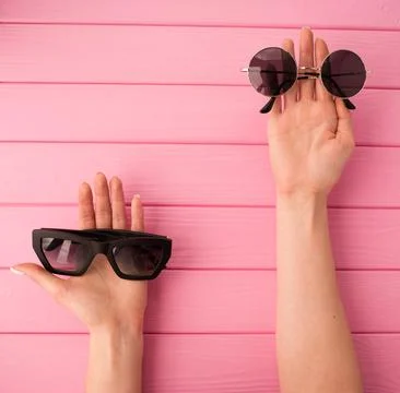 Summer abstract background mockup template woman hands hold Couple sunglass.. Stock Photos