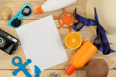 Summer accessories. beach accessories. hat, sunscreen, sunglasses, camera, an Stock Photos