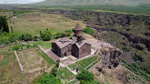 Summer aerial orbit movement around ancient Armenian church Saghmosavank,Armenia Stock Footage 268230871