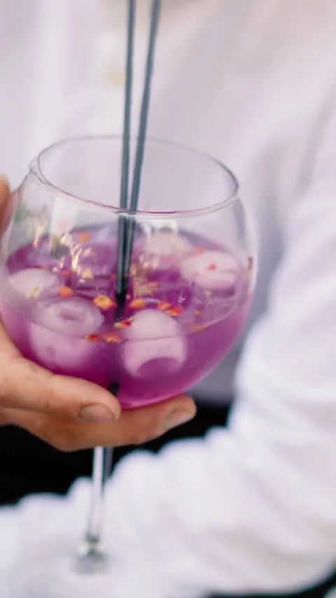 A summer alcoholic purple drink A close-up of lemonade for freshness. Video stock 336617626