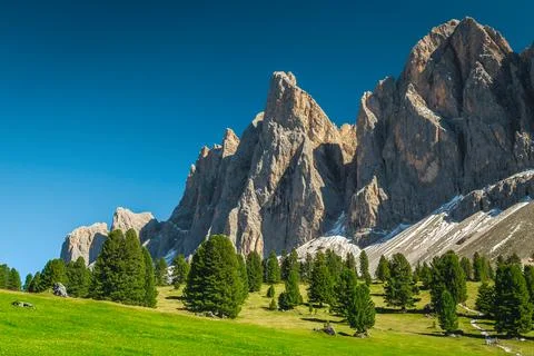 Summer alpine scenery with high cliffs in the Dolomites, Italy Stock Photos
