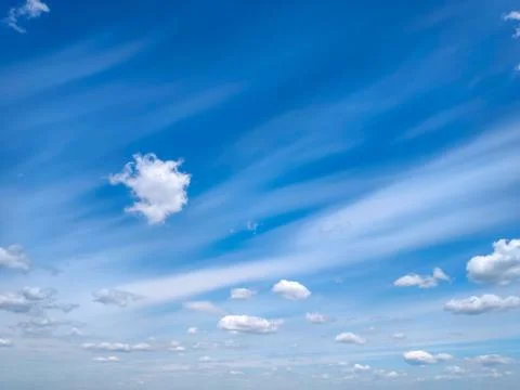 Summer background of the blue sky with clouds Stock Photos