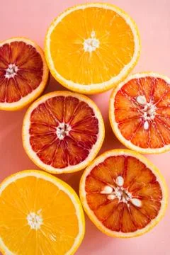 Summer background half of citrus. Creative summer pink background. Stock Photos