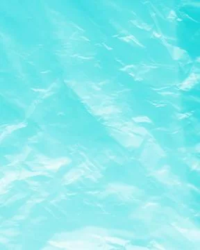 Summer background plastic blue wrinkle bag film glossy crumpled overlay 写真素材