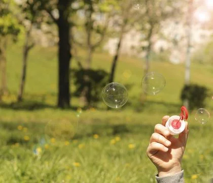 Summer background with soap bubbles Stock Photos