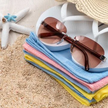 Summer beach background design concept with accessories on white table backgr Stock Photos
