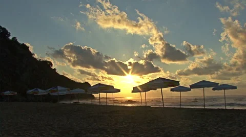 Summer Beach coast with umbrellas at Sunset, Sunrise. Stock Footage 47209161