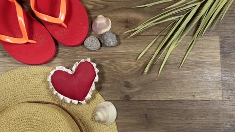 Summer Beach Essentials Featuring Flip-Flops, Straw Hat Stock Footage 333780970