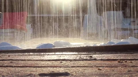 Summer beach shower in bright evening sunlight. Wall tropical rain, drops fall Stock Footage 138884760