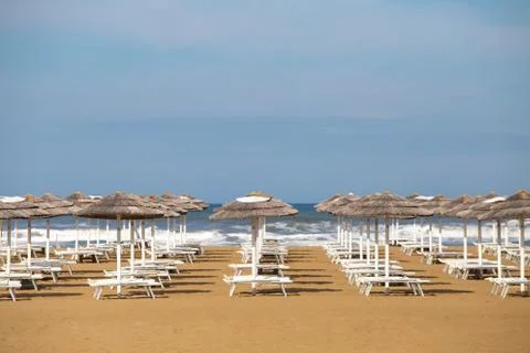 Summer beach withl umbrellas Stock Photos