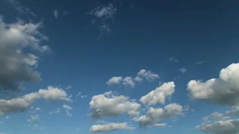 Summer blue sky time lapse with white fluffy clouds Stock Footage 145023408