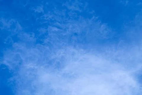 Summer Blue Sky with Tiny White Clouds Stock Photos