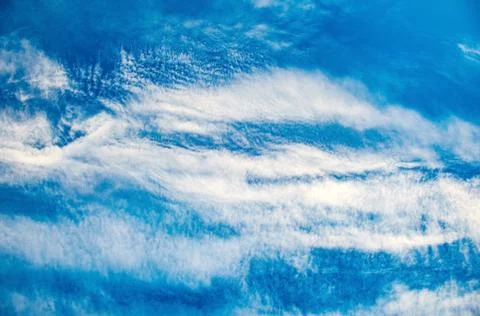Summer bright blue sky with clouds outdoor background Stock Photos