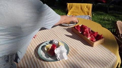 Summer bright holiday table setting in a yellow palette with lemons, garden flow Video stock 278955796